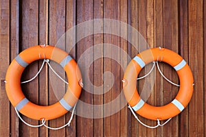 Personal flotation device hanging on the wall photo
