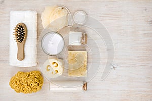 Personal hygiene objects on wood, view from above, right copyspace