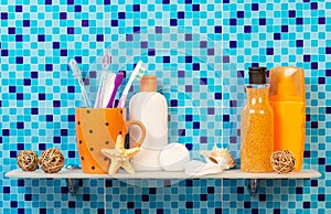 Personal hygiene products on the shelf in bathroom