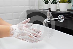 Personal hygiene. washing hands, rubbing hand thoroughly with soap that has a lot of bubbles for cleaning and disinfection