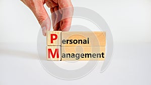 Personal management symbol. Concept words `Personal management` on wooden blocks on white table, white background, copy space.