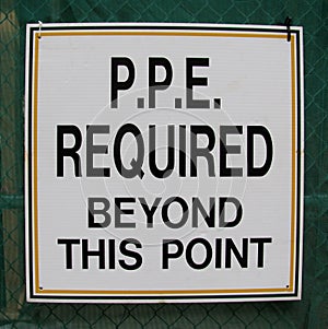 Personal protective equipment (PPE) required beyond this point sign