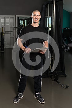 Personal Trainer With Clipboards