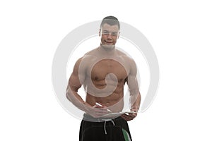 Personal Trainer With Clipboards Over White Background photo