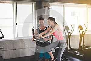 Personal trainer coaching woman exercise workout in gym,Concept healthy and lifestyle