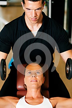 Personal Trainer in gym