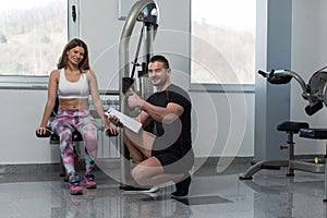 Personal Trainer Showing Ok Sign To Client