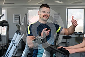 Personal Trainer Showing Ok Sign To Client