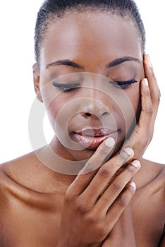 Personality as charming as her beauty. Closeup studio shot of a beautiful african american model isolated on white.