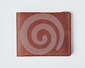 Personalized brown leather billfold wallet with embossing on white