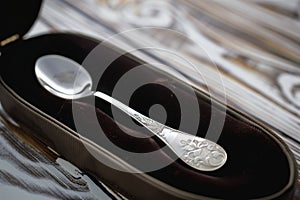 personalized silver baby spoon in a velvet case