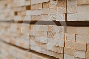 Perspective angle of wooden planks in close-up at a lumber warehouse