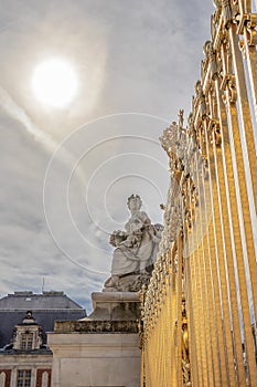 Perspective and back light view of fence at exterior facade of Versailles Palace