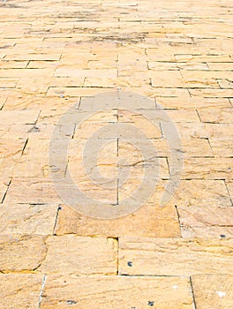 Perspective background : Sand stone brick perspective floor,text