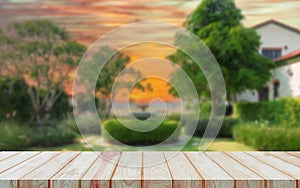 perspective board over blurred garden in countryside