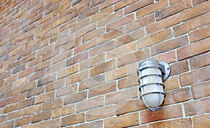 Perspective brick wall with lamp