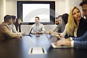 Perspective businesspeople having meeting in conference room