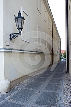 Perspective of a bystreet with a lantern