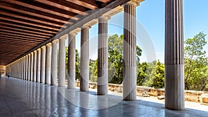 Perspective of classical building columns in ancient Agora, Athens, Greece. Panoramic view inside the Stoa of Attalos