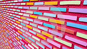 Perspective of colorful brick wall