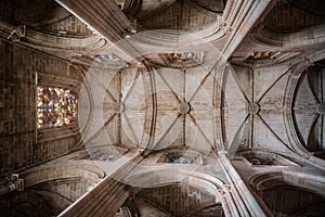 Perspective of columns,ceiling and windows of the monastery of Santa Maria da VitÃ³ria, Batalha PORTUGAL photo