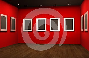 Perspective of empty frames on red walls