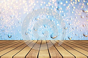 Perspective emtry wooden table on top over blur background, can
