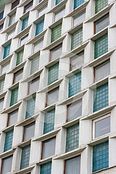 Perspective of green windows. Vertical background. Constructivism. Soviet architecture