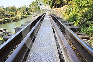 Perspective of old wood bridge railways in kanchanaburi thailand