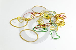 Perspective shot of spreaded colorful rubber bands with white background