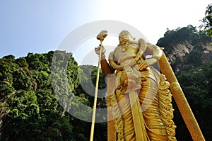 Perspective shot of Statue of Hindu God, Lord Murugan in Batu Caves, Kuala Lumpur,