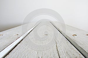 Perspective of three white sheets of rustic wood on white 3D space background for mockup. Rustic wood planks pattern. Design