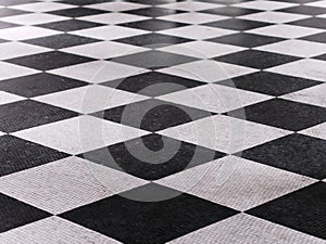 Black and white checkered marble floor pattern photo