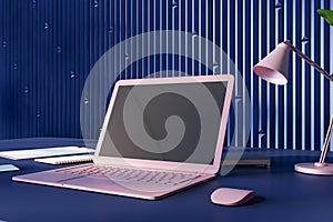 Perspective view on blank dark screen with space for your logo on modern pink laptop on dark table with notebooks and stylish lamp