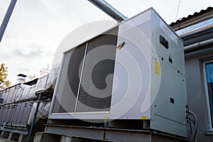 Perspective view of the gray commercial cooling unit for central ventilation system