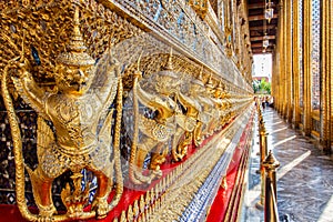Perspective view of golden religious statue Statue Garuda in wat phra kaew temple, Bangkok, Thailand