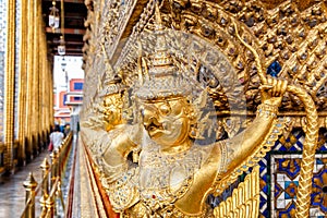 Perspective view of golden religious statue Statue Garuda in wat phra kaew temple, Bangkok, Thailand