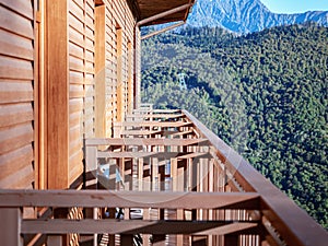 Perspective view of hotel balconies on a background of green mountains