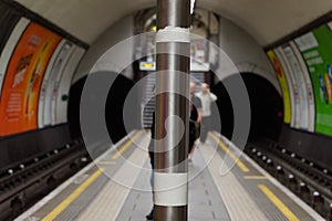 Perspective view of an island platform at Clapham Common station on the London Underground photo