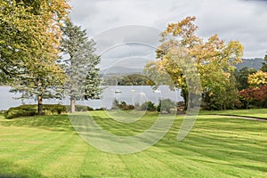 Perspective view of lake Derwentwater from a sunlit garden