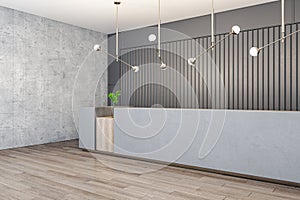 Perspective view on long empty blank concrete reception desk with space for your logo or text in stylish sunlit office area with