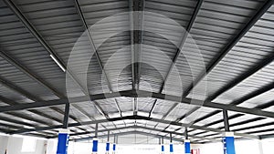 perspective view metal sheet roof install on steel structure of factory