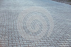 Perspective View Monotone Gray Brick Stone Pavement on The Ground for Street Road. Sidewalk, Driveway, Pavers, Pavement