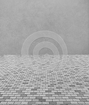 Perspective View of Monotone Gray Brick Stone Street Road. Sidewalk with Abstract Gray Wall