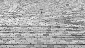 Perspective View of Monotone Gray Brick Stone Street Road. Sidewalk, Pavement Texture photo