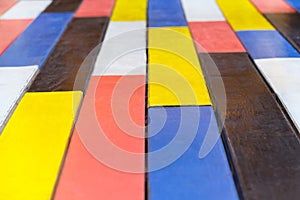 Perspective view on a multi colored wooden planks