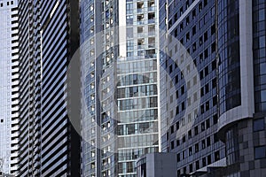 perspective view of new modern glasses building exterior architecture shot in Batumi, Georgia. Abstract fragment of modern blue