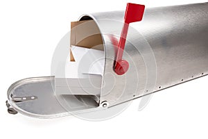 Perspective view of an open old school retro tin mailbox bulging with a pile of letters and box parcel on white  backgroun