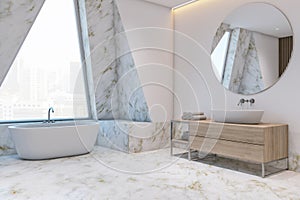 Perspective view on spacious bathroom with big round mirror above light wooden sink cabinet, stylish white bath on glossy marble