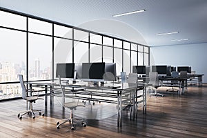 Perspective view on stylish minimalistic design workspaces with modern computers on wooden floor and city view from big window. 3D